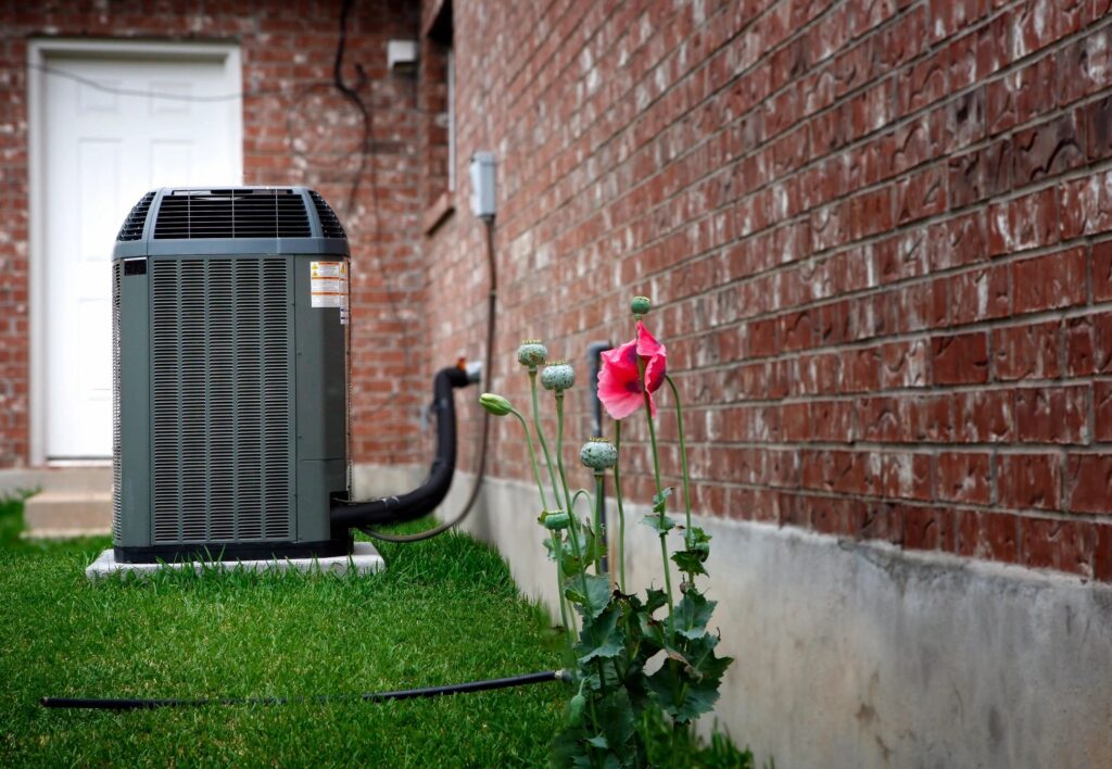 An air conditioner that's been installed by an HVAC business.