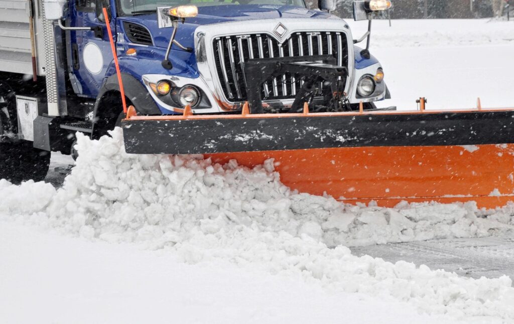 A snow plow clearing snow